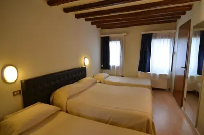 Letto o letti in una camera di Piccolo Tiepolo