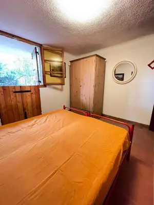 Letto o letti in una camera di VILLA CA' SILVA - WALTERIGATO Apartments SOLO PER FAMIGLIE