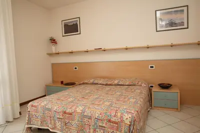 Letto o letti in una camera di Villini Joker ai Frassini