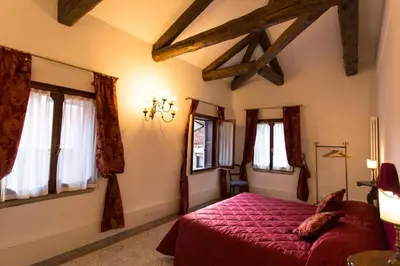 Letto o letti in una camera di Ca' Nal Apartments