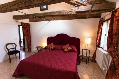 Letto o letti in una camera di Ca' Nal Apartments