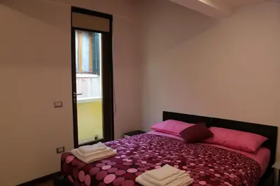Letto o letti in una camera di Alessandra House