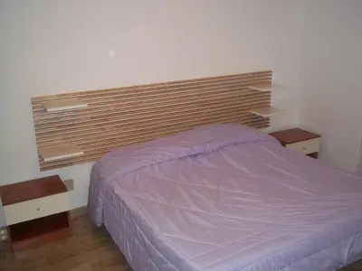 Letto o letti in una camera di Appartamento Gronda Lagunare