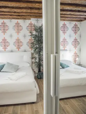 Letto o letti in una camera di Venice Palace Tintoretto by Wonderful Italy