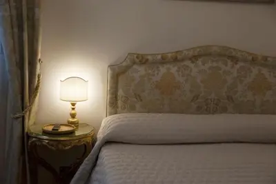 Letto o letti in una camera di Residenza Calle Larga San Marco