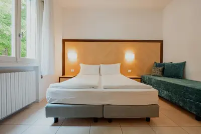 Letto o letti in una camera di Junior Depandance