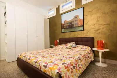 Letto o letti in una camera di La Terrazza di Vivaldi