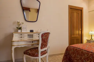 Letto o letti in una camera di Venice Inn