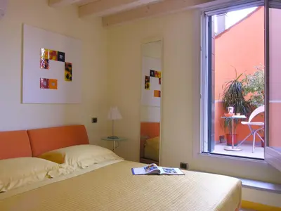 Letto o letti in una camera di Casa Nova