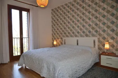 Letto o letti in una camera di Montello Apartment a pochi passi dal centro