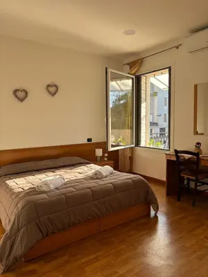 Letto o letti in una camera di Locanda Caffe Sport