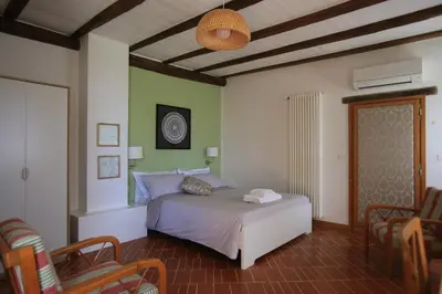 Letto o letti in una camera di I grilli b&b