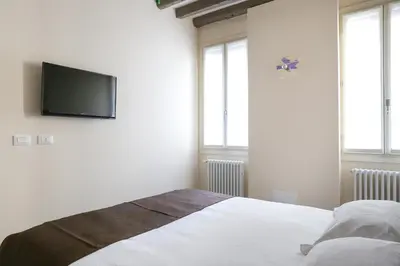Letto o letti in una camera di Rialto Suite 1602