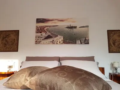Letto o letti in una camera di Appartamento Angelo Emo
