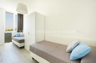 Letto o letti in una camera di Palms