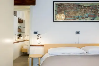 Letto o letti in una camera di VeNICe Cera Casa Santo Stefano