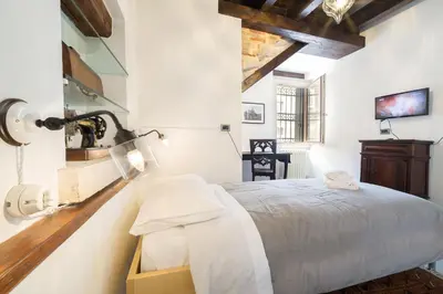Letto o letti in una camera di VeNICe Cera Casa Santo Stefano