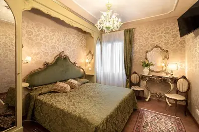 Letto o letti in una camera di Hotel Bel Sito e Berlino