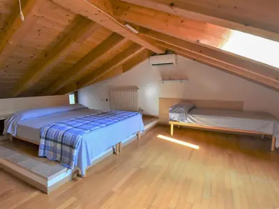 Letto o letti in una camera di Apartment Solmare-33 by Interhome