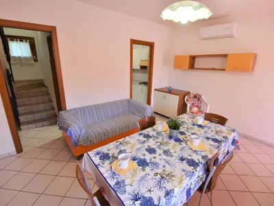 Area soggiorno di Apartment Solmare-33 by Interhome