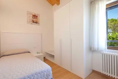 Letto o letti in una camera di Cà Del Pioppo