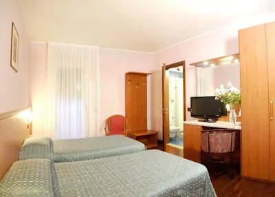 Letto o letti in una camera di Hotel Dal Ponte