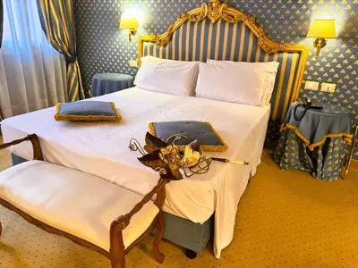 Letto o letti in una camera di Hotel Corte Contarina