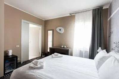 Letto o letti in una camera di Hotel Cannaregio 2357