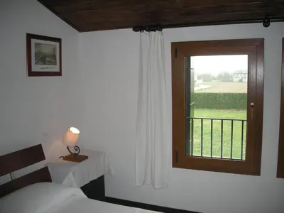 Letto o letti in una camera di Temporin Ospitalità
