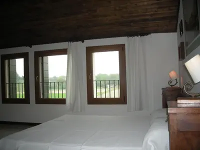 Letto o letti in una camera di Temporin Ospitalità