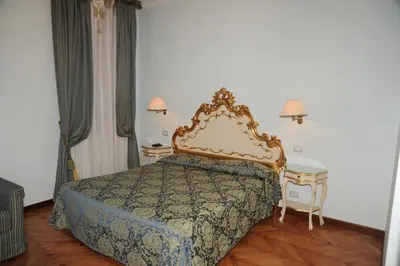 Letto o letti in una camera di Alloggi Santa Sofia