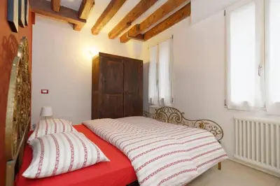 Letto o letti in una camera di Salizada San Francesco