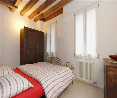 Letto o letti in una camera di Salizada San Francesco