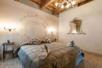 Letto o letti in una camera di San Marco Luxury Apartment - Muneghe