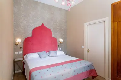 Letto o letti in una camera di Hotel Villa Rosa