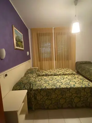 Letto o letti in una camera di Agostini Daniela B&B
