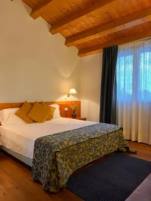 Letto o letti in una camera di Hotel Due Torri Tempesta