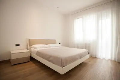 Letto o letti in una camera di Casa di Lucia