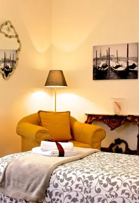 Letto o letti in una camera di Casa Giuliana