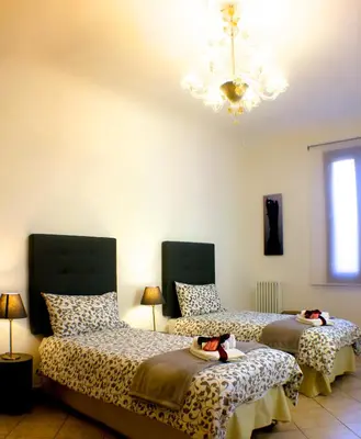 Letto o letti in una camera di Casa Giuliana
