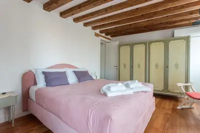 Letto o letti in una camera di Appartamento Calle Furlani