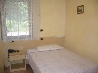 Letto o letti in una camera di Locanda Zabotto