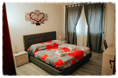 Letto o letti in una camera di Casa Alyssa