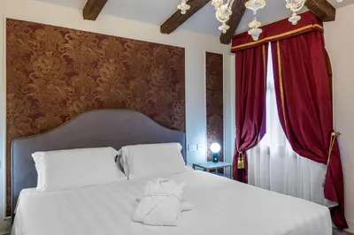 Letto o letti in una camera di Hotel Palazzina Sardi
