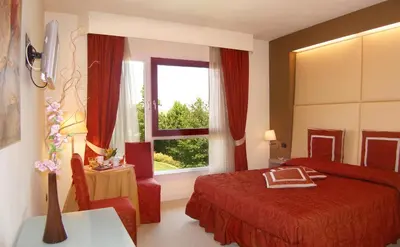 Letto o letti in una camera di Relais Villa Annamaria Bed end Breakfast