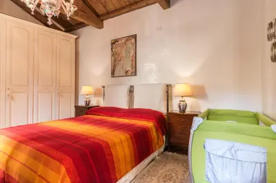Letto o letti in una camera di Serenissima