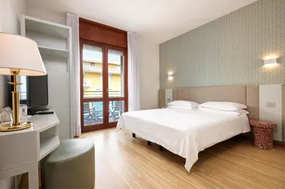 Letto o letti in una camera di Hotel Croce Di Malta
