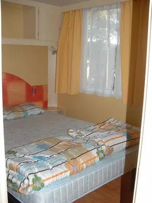 Letto o letti in una camera di Sunny Beach Mobile Homes Rosapineta