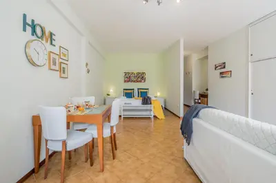 Letto o letti in una camera di ARCA Conte Rosso Apartments