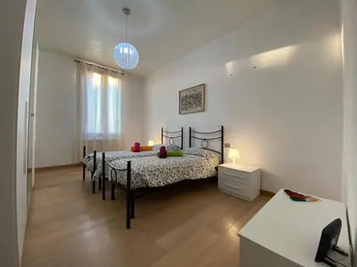 Letto o letti in una camera di Ca' Santa Marta Apartment